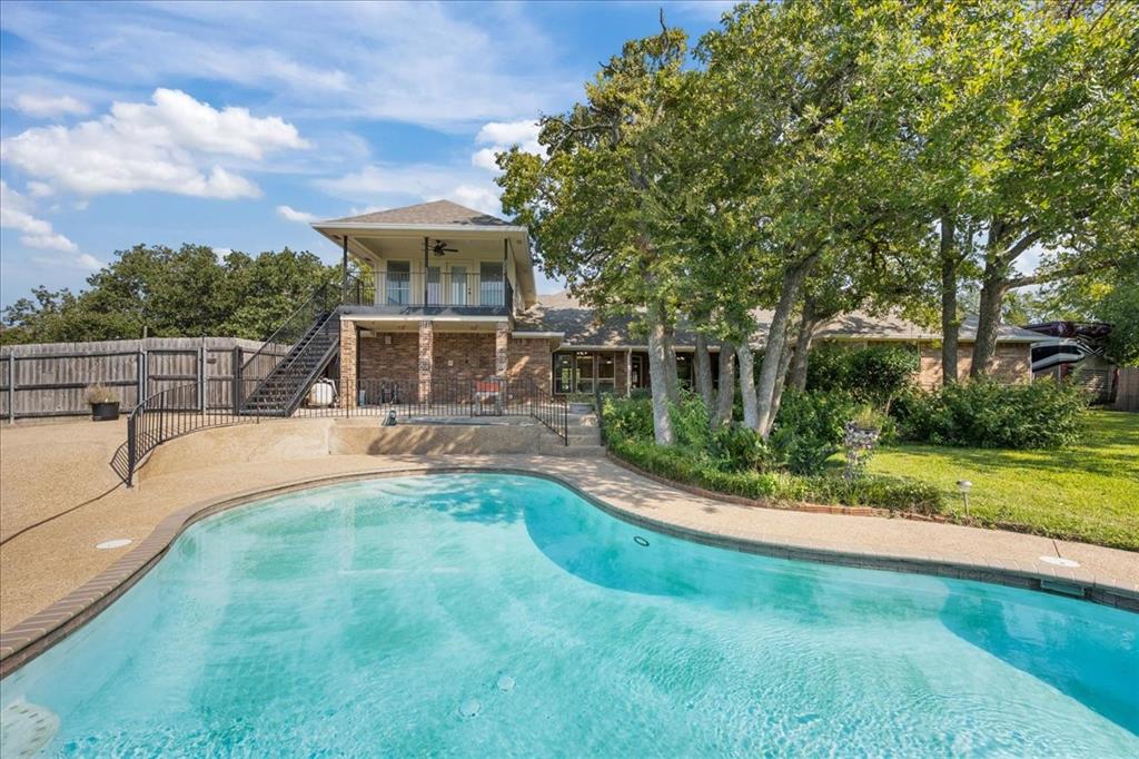 8300 Jonquil Drive Waco, TX 76708 - Photo 34 of 40 a view of a house with a yard