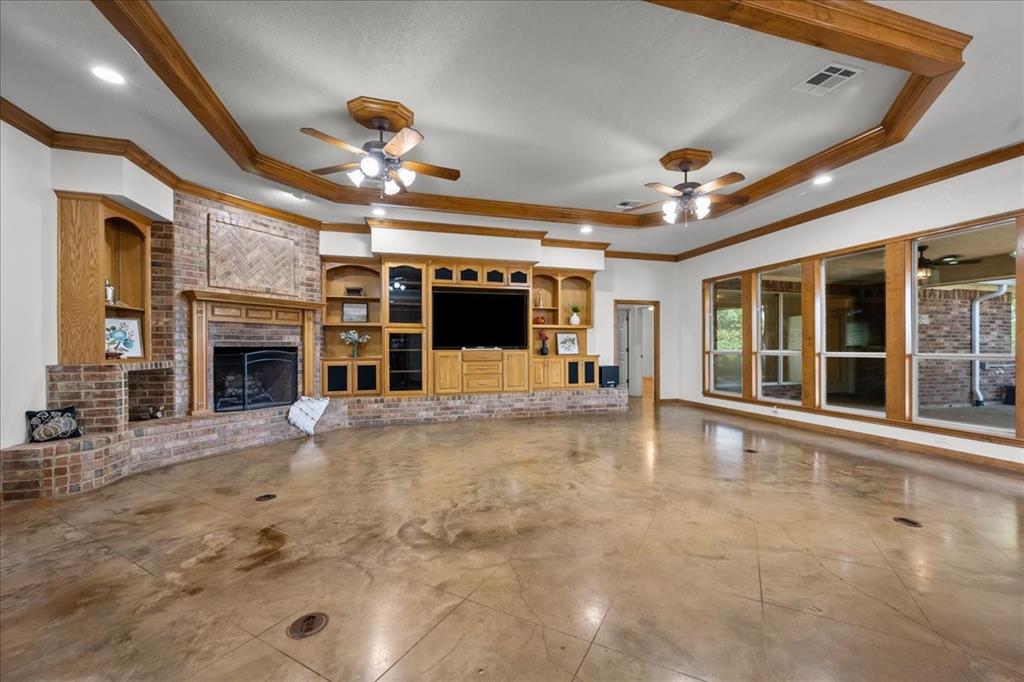 8300 Jonquil Drive Waco, TX 76708 - Photo 4 of 40 a view of an entryway with a fireplace