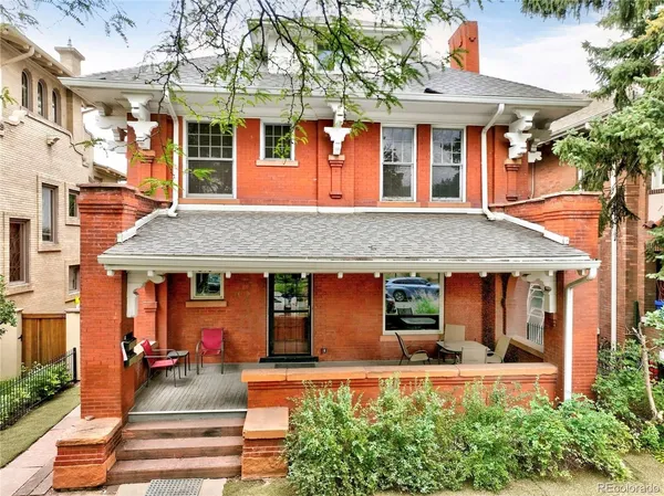 a front view of a house with an outdoor space