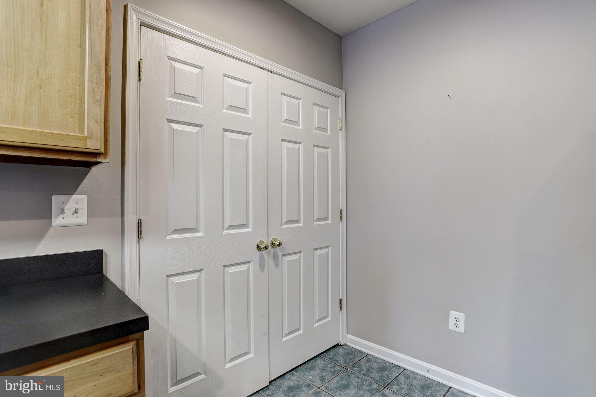 3 Hawk Rise Lane, Unit 103 Owings Mills, MD 21117 - Photo 14 of 41 Laundry Closet