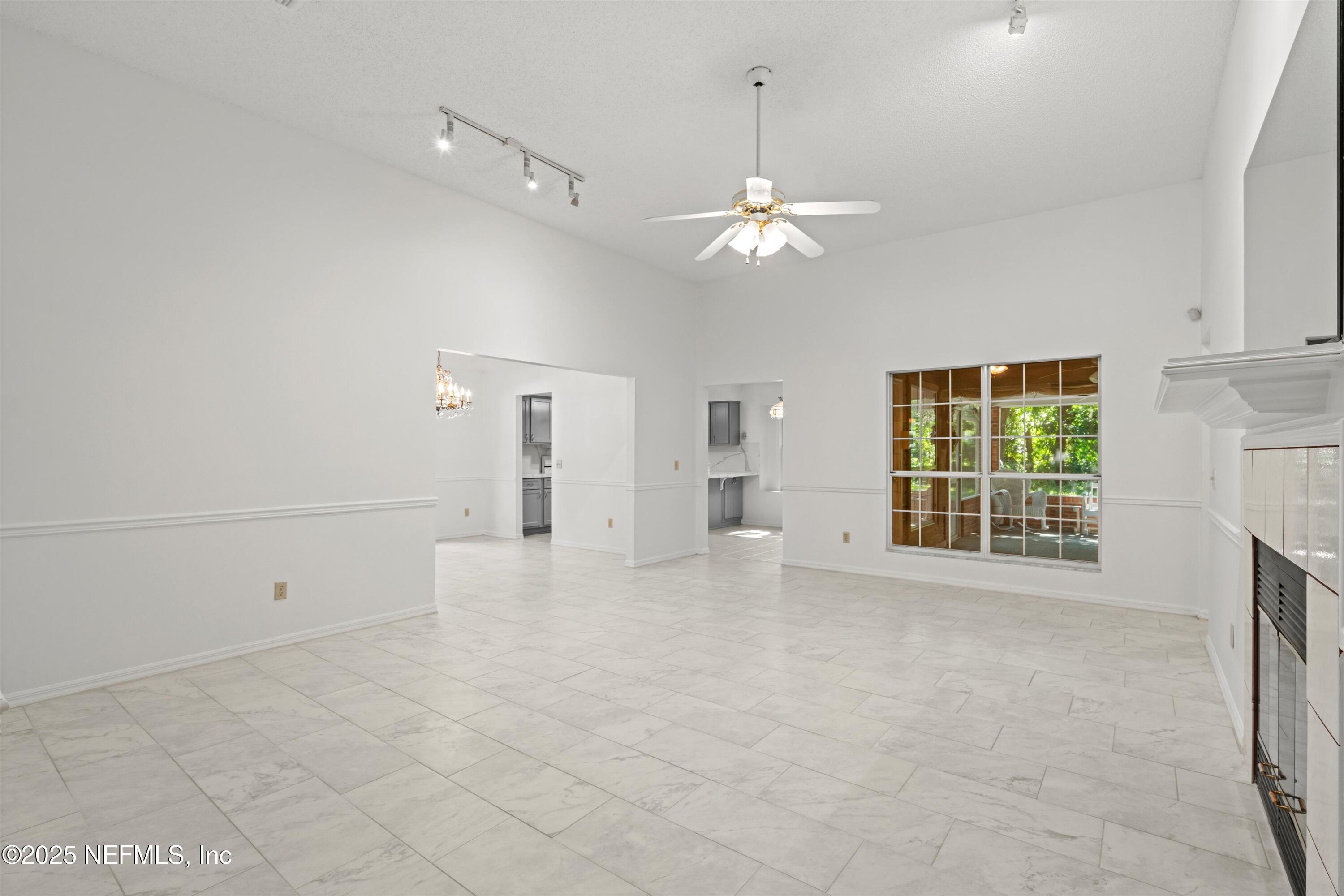 3297 Turtle Creek Road St. Augustine, FL 32086 - Photo 11 of 35 a view of an empty room with a window