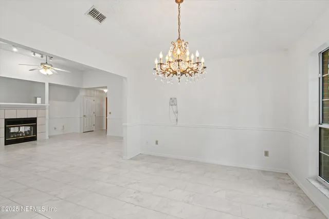 a kitchen with stainless steel appliances a refrigerator sink and stove