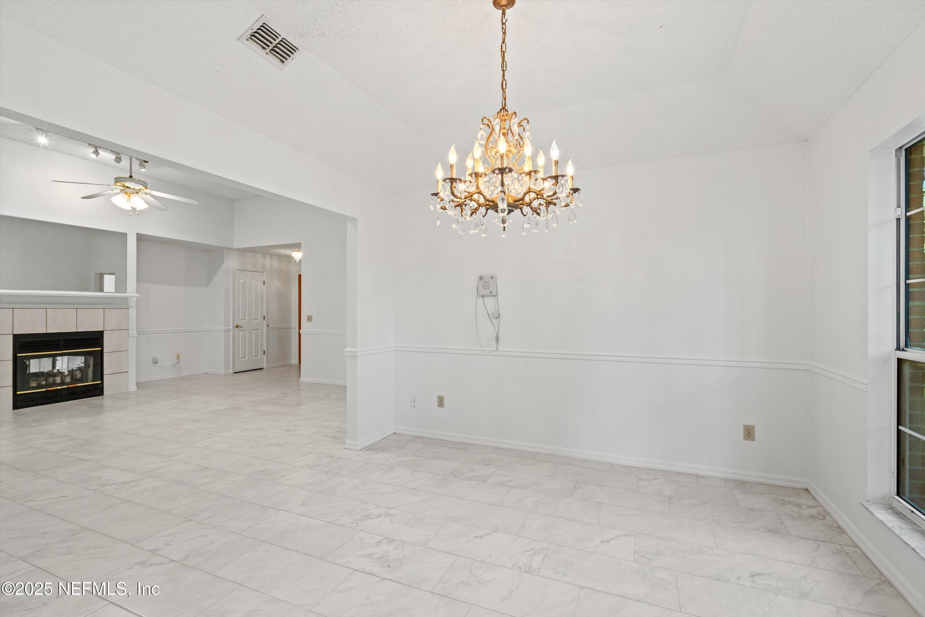 3297 Turtle Creek Road St. Augustine, FL 32086 - Photo 15 of 35 a view of a chandelier in a room