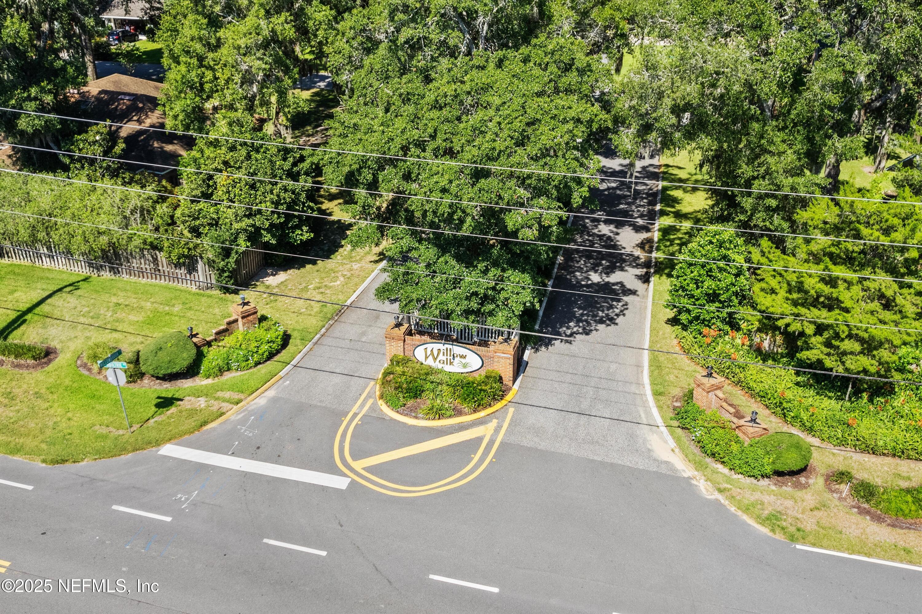 3297 Turtle Creek Road St. Augustine, FL 32086 - Photo 3 of 35 a view of a garden with potted plants