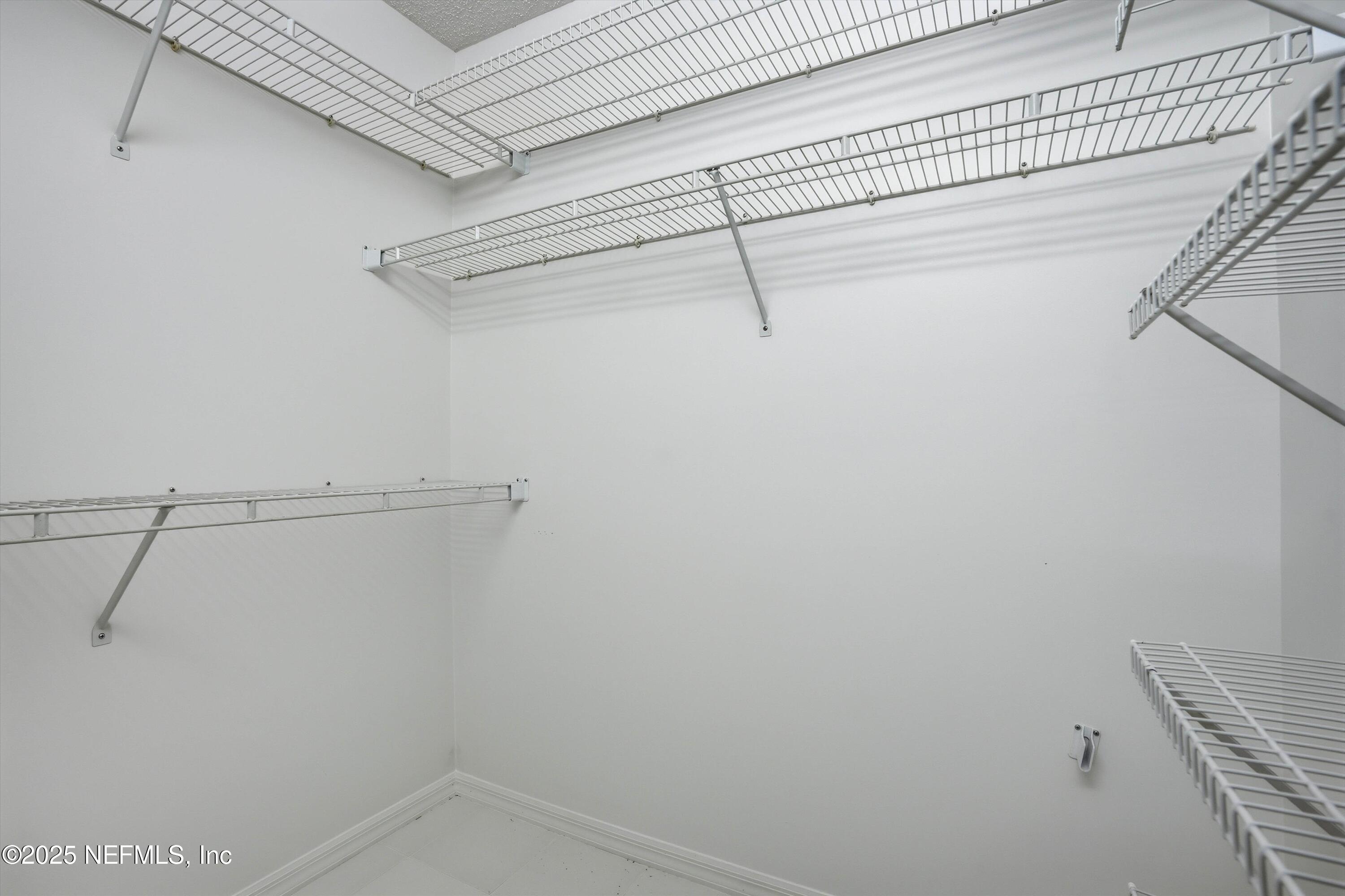 3297 Turtle Creek Road St. Augustine, FL 32086 - Photo 33 of 35 a view of a room with racks on the wall