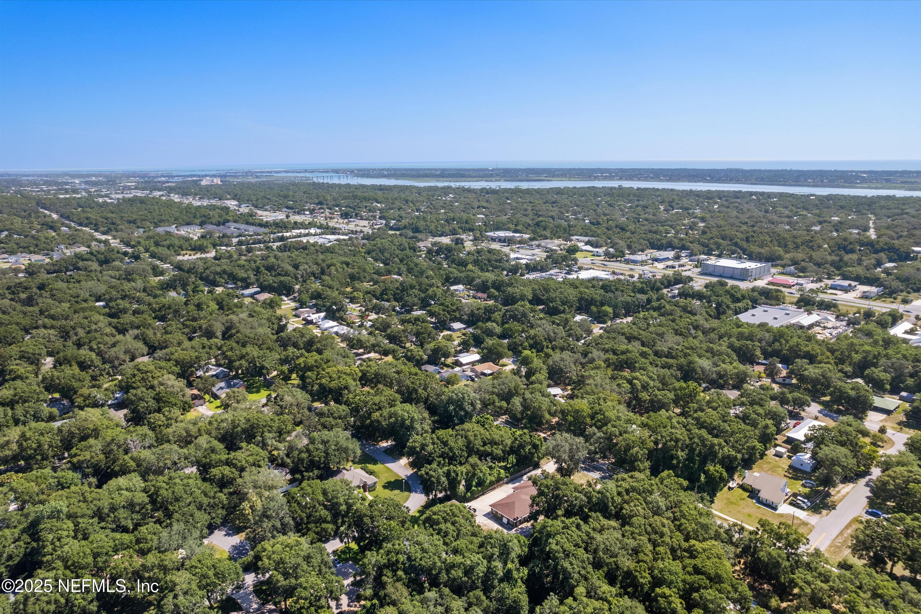 3297 Turtle Creek Road St. Augustine, FL 32086 - Photo 10 of 35 an aerial view of a city with lots of residential buildings