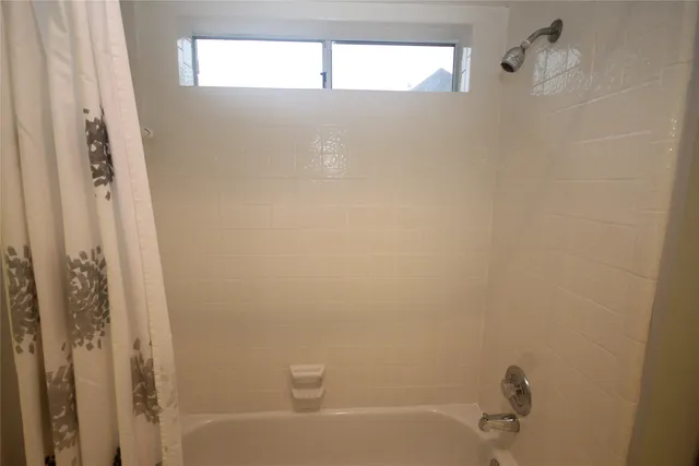 a bathroom with a bathtub