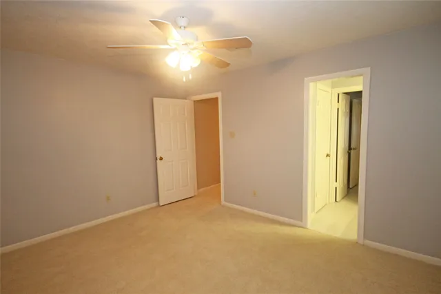 an empty room with a bathroom