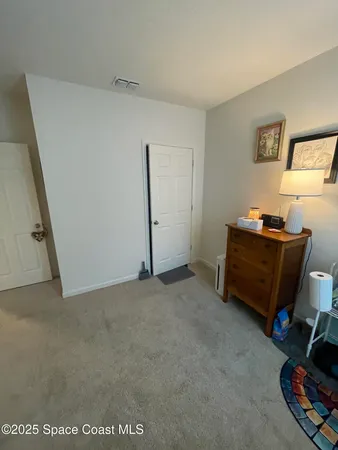 a room with furniture and a window