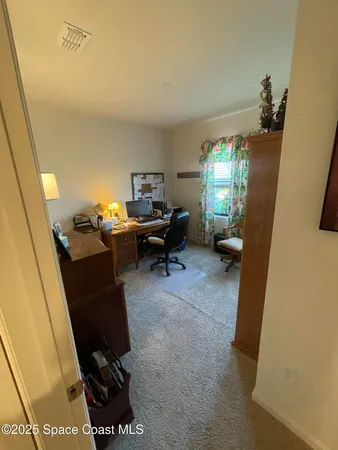 a room with furniture and a piano
