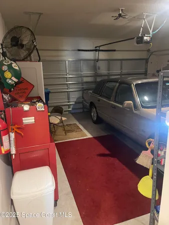 a room with furniture and a window