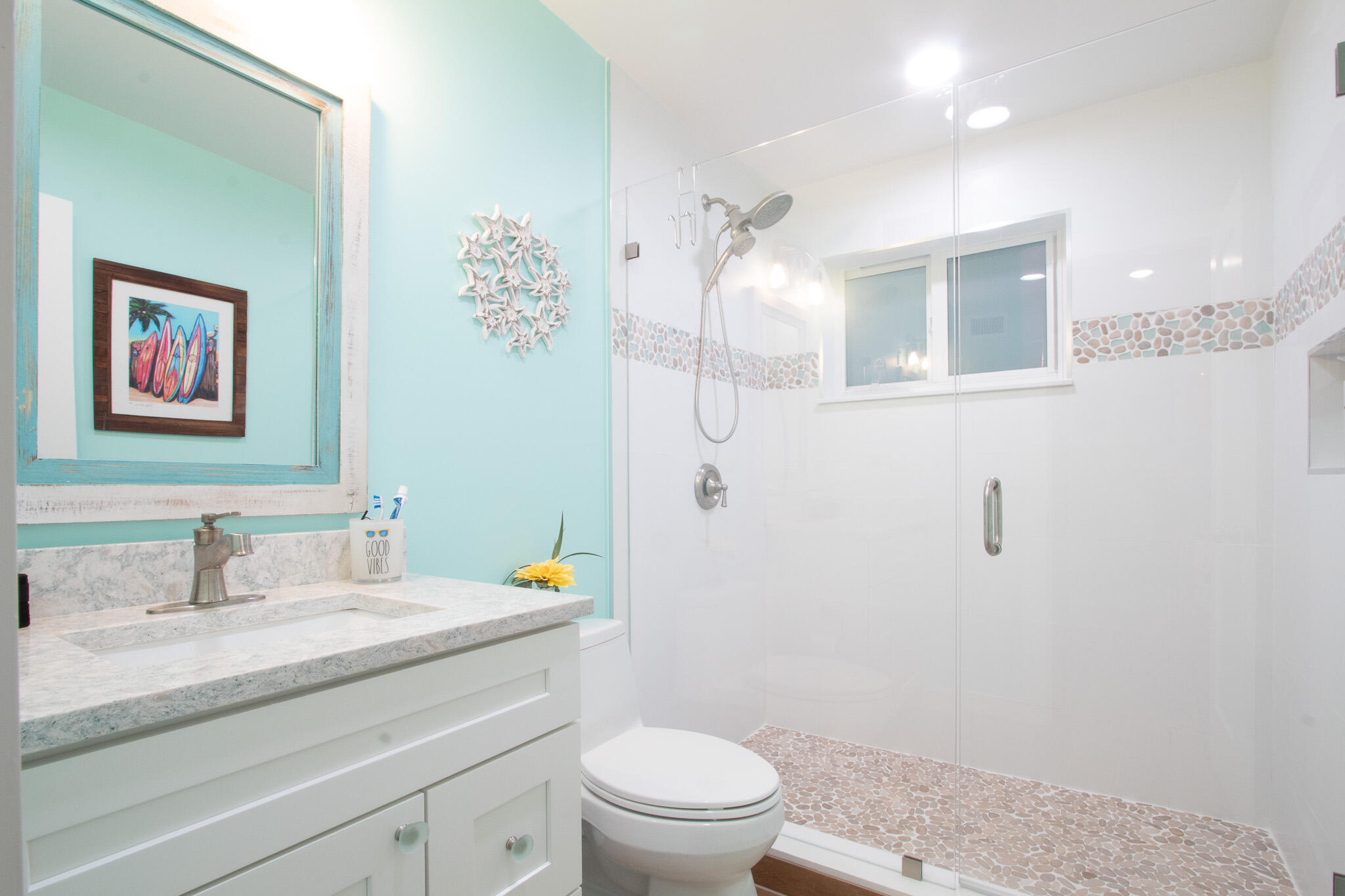 205 Sunset Boulevard Key Largo, FL 33037 - Photo 18 of 42 a bathroom with a granite countertop sink a toilet and a mirror