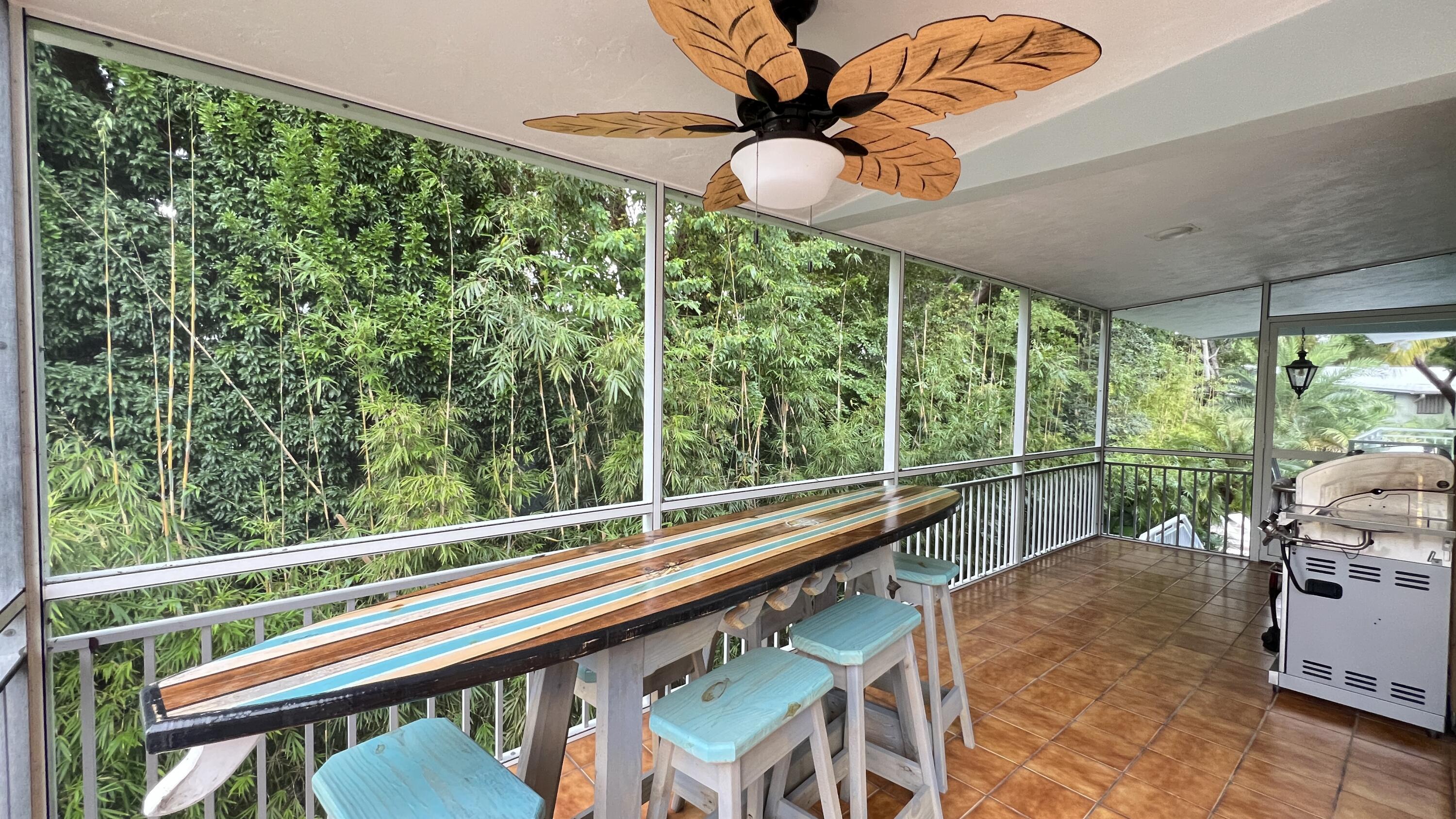 205 Sunset Boulevard Key Largo, FL 33037 - Photo 22 of 42 a view of a two chairs in the balcony