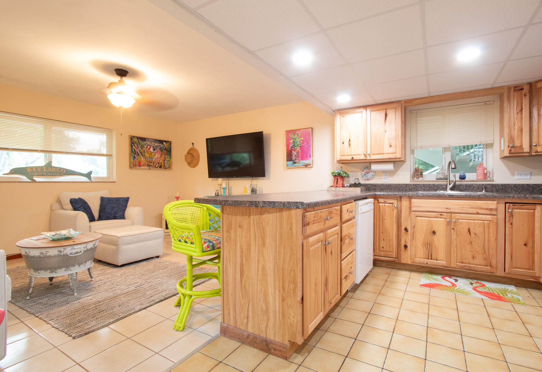 205 Sunset Boulevard Key Largo, FL 33037 - Photo 27 of 42 a kitchen with a sink cabinets and window