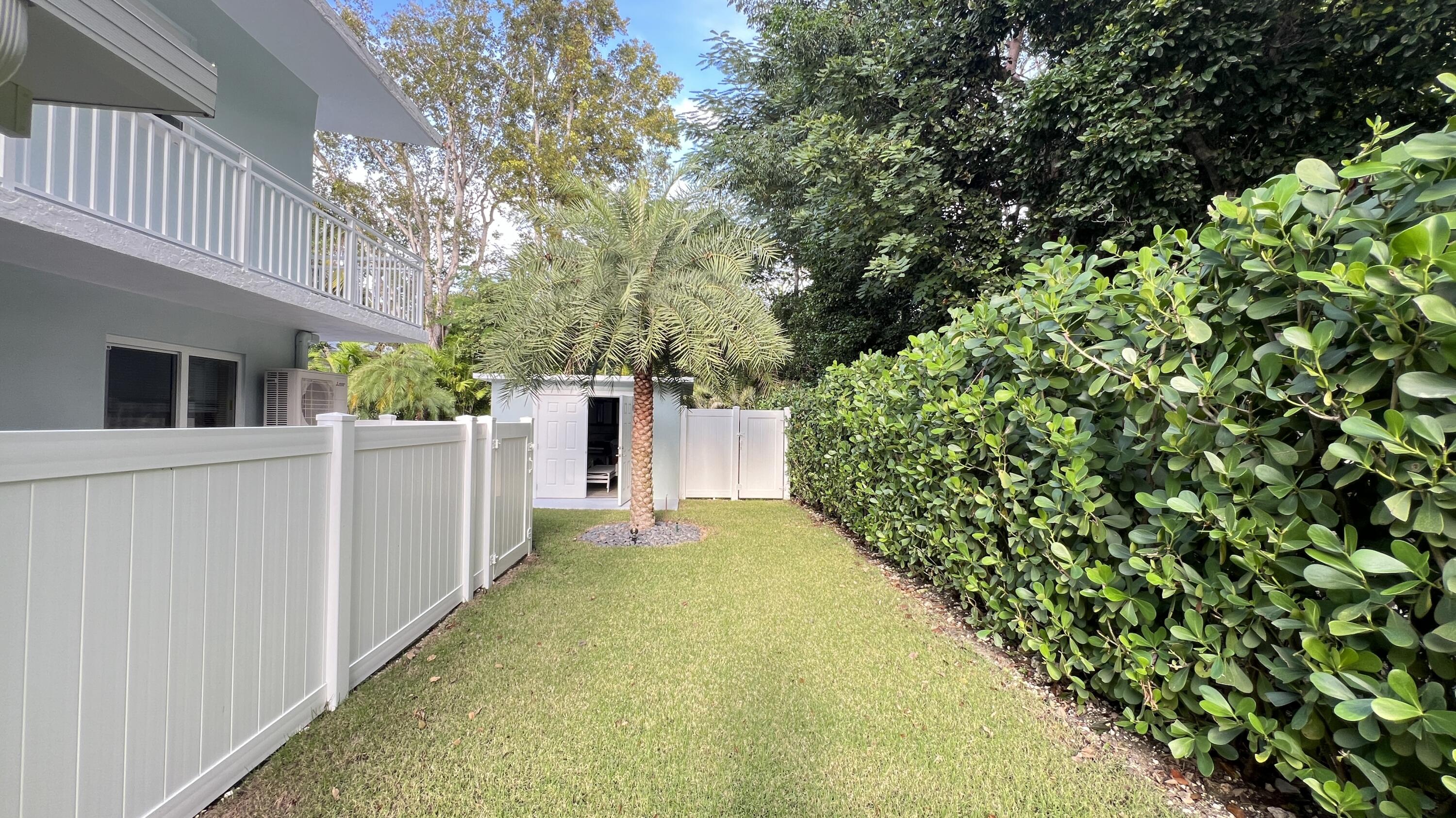 205 Sunset Boulevard Key Largo, FL 33037 - Photo 33 of 42 a bathroom with a sink and mirror