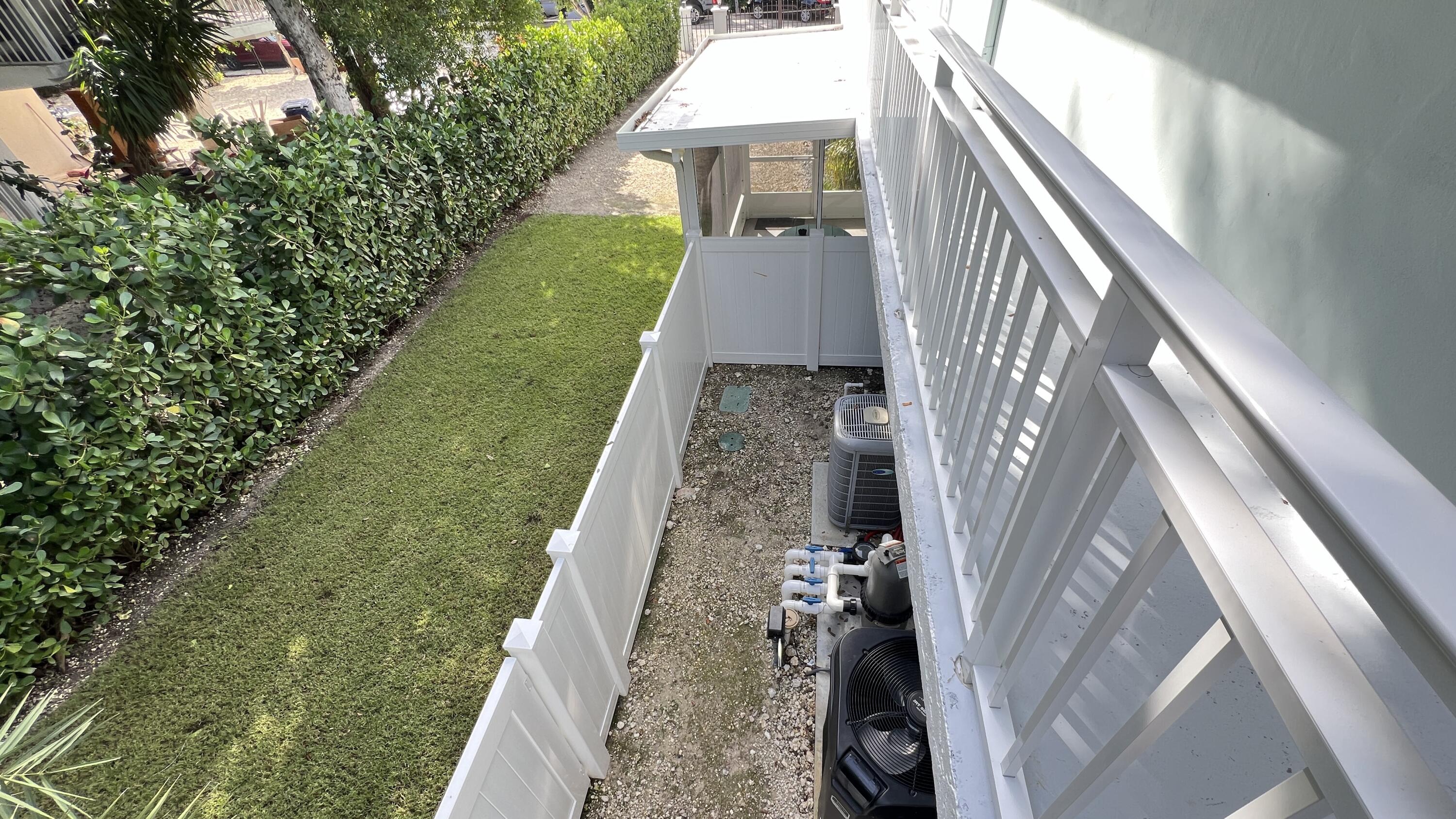 205 Sunset Boulevard Key Largo, FL 33037 - Photo 34 of 42 a view of a yard from a balcony