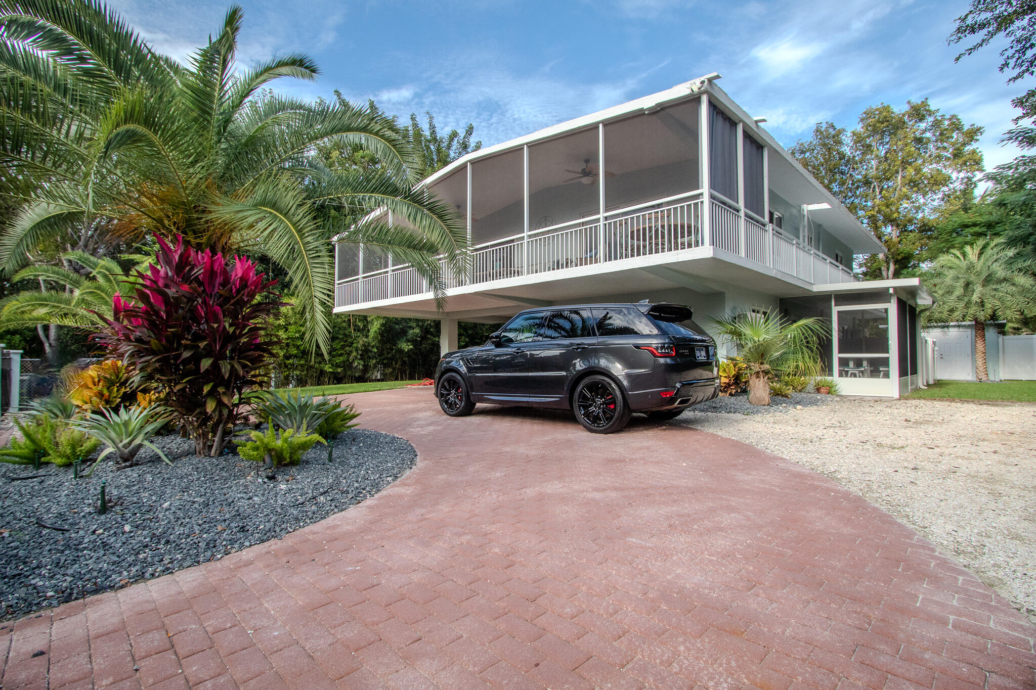 205 Sunset Boulevard Key Largo, FL 33037 - Photo 41 of 42 a house view with a garden space