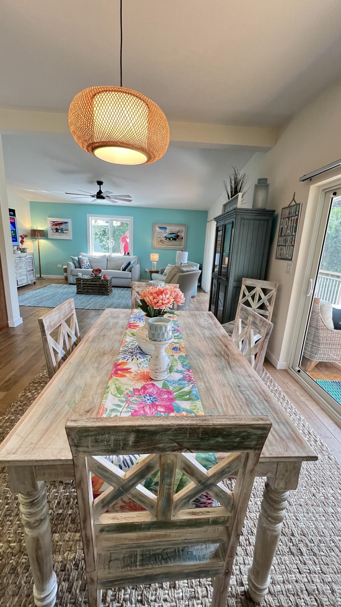 205 Sunset Boulevard Key Largo, FL 33037 - Photo 6 of 42 a living room with furniture and a dining table