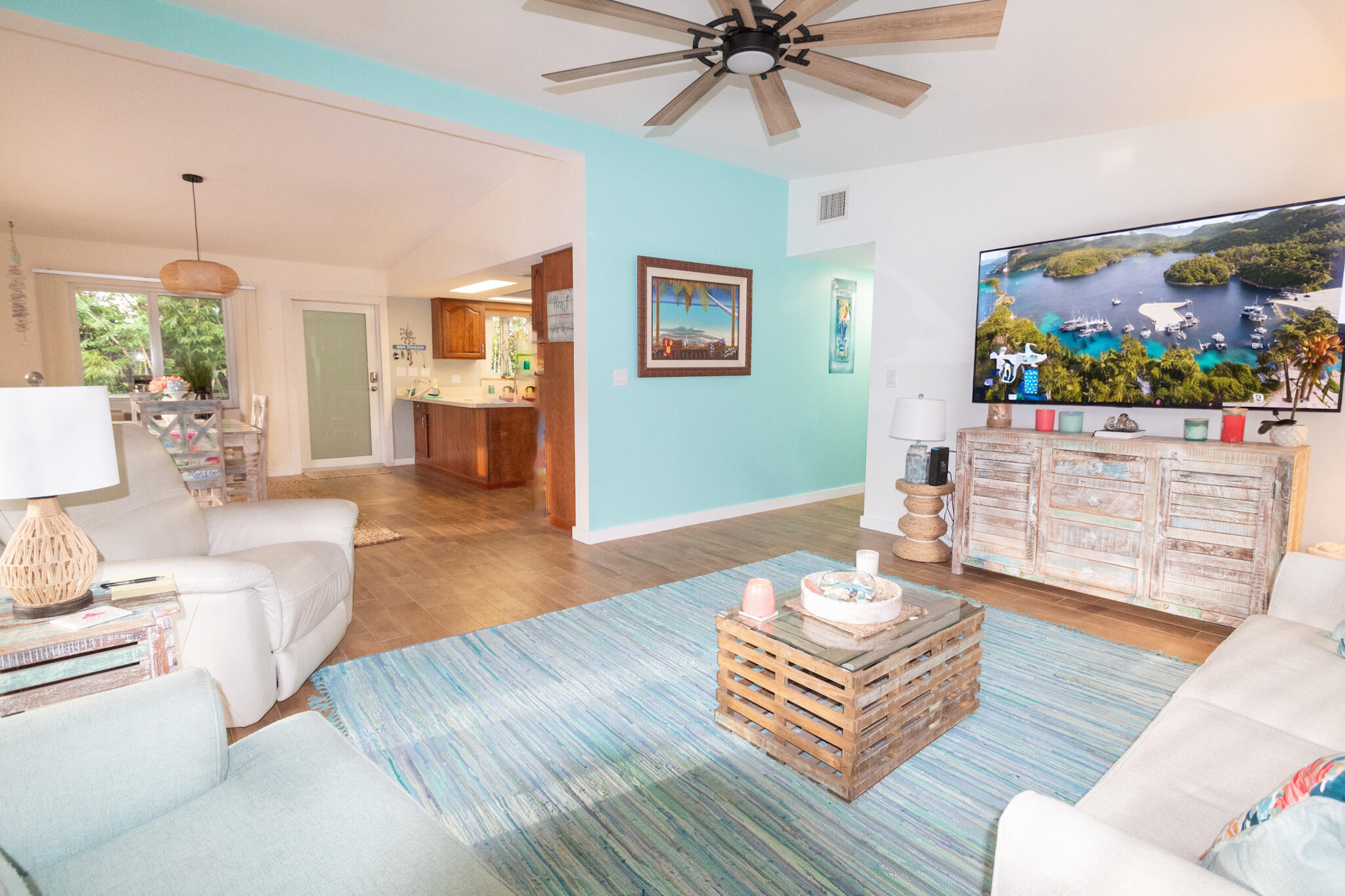205 Sunset Boulevard Key Largo, FL 33037 - Photo 9 of 42 a living room with furniture and a flat screen tv