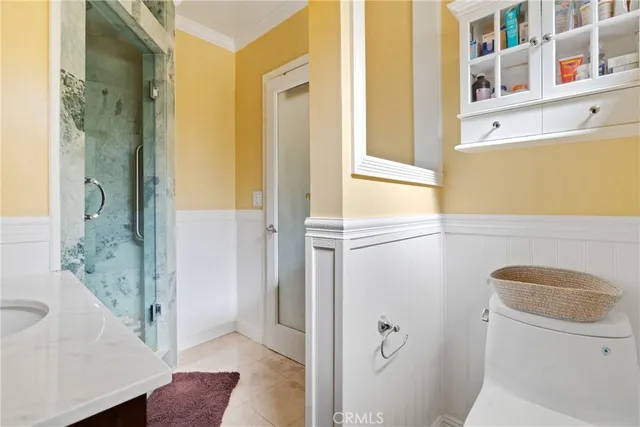 a view of bathroom with a shower and toilet