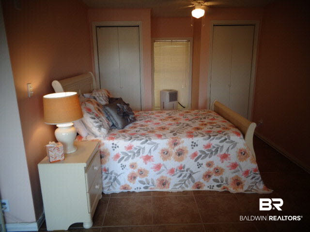 6674 Cook Road Foley, AL 36535 - Photo 31 of 45 17x13. French doors lead into bedroom. Tiled floor. Ceiling fan/light. 2 closets.