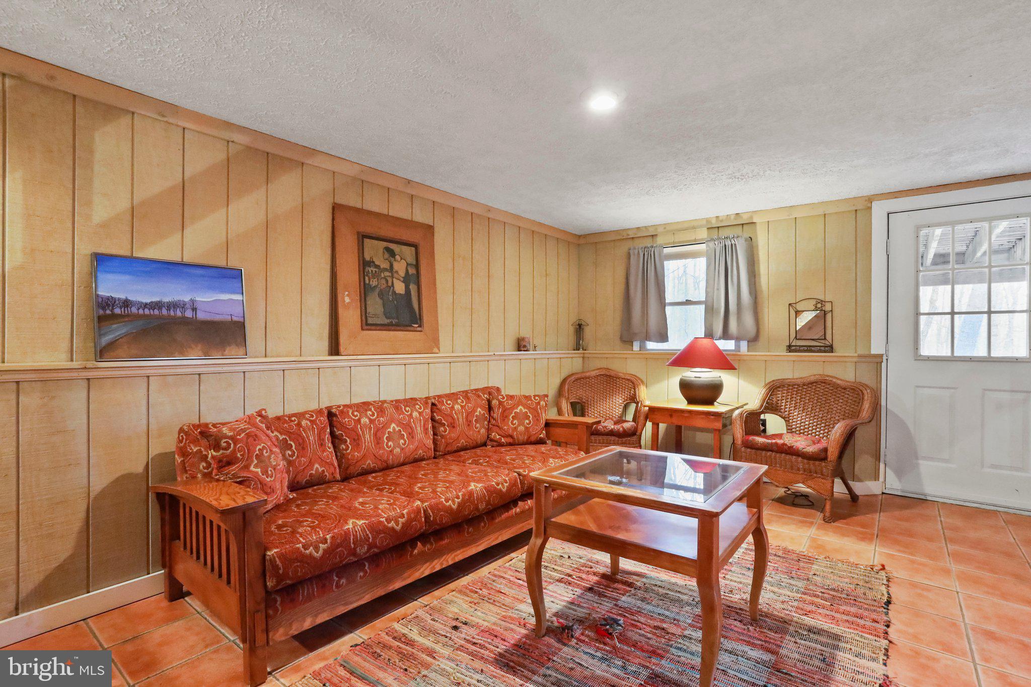 13 Mountainside Loop Berkeley Springs, WV 25411 - Photo 40 of 57 a living room with furniture and wooden floor