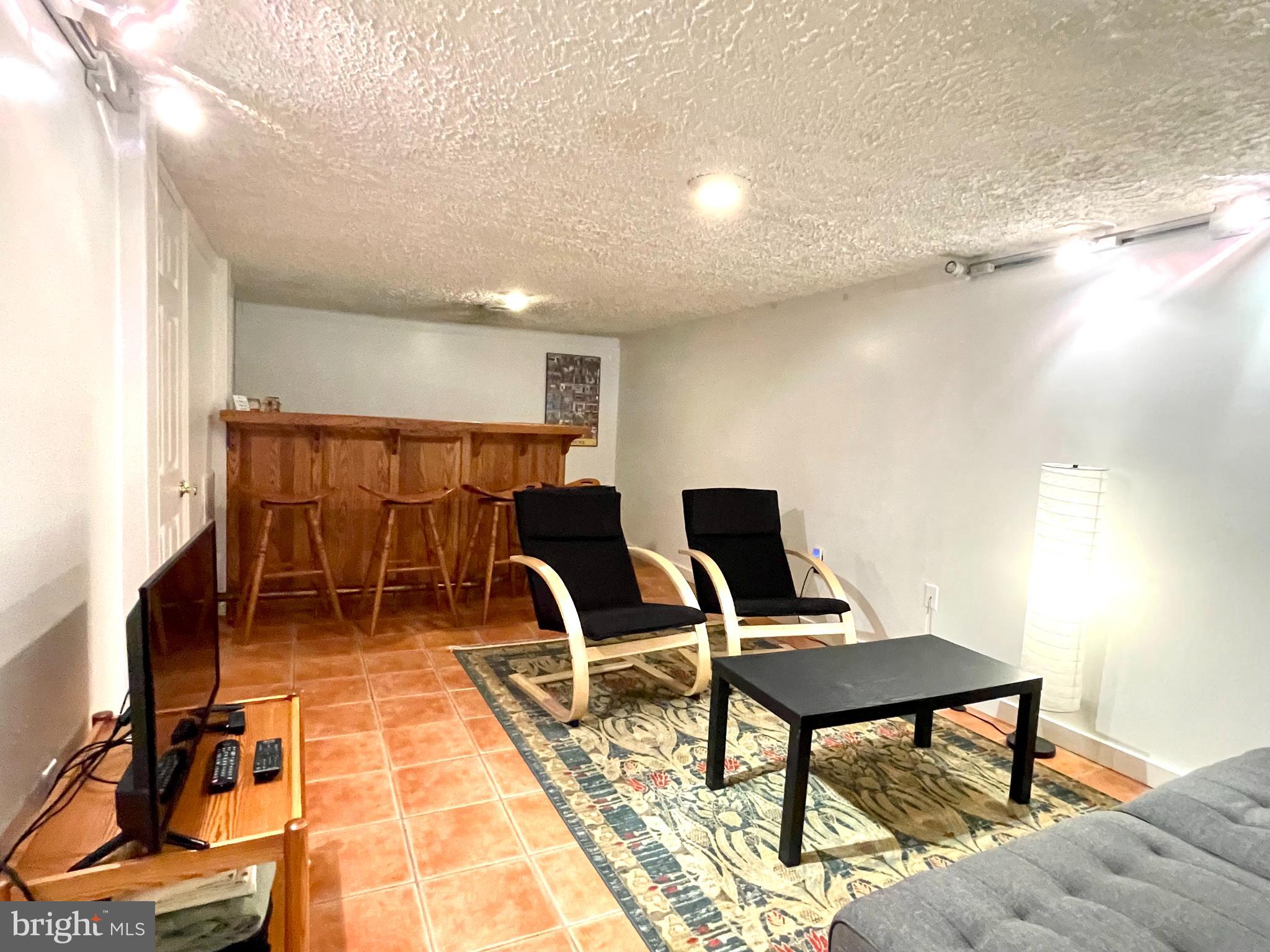 13 Mountainside Loop Berkeley Springs, WV 25411 - Photo 50 of 57 a workspace with furniture and a rug