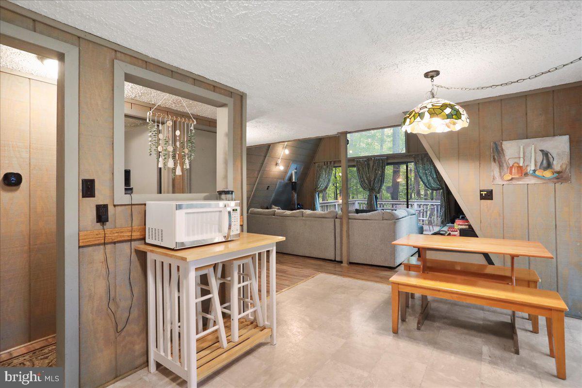 13 Mountainside Loop Berkeley Springs, WV 25411 - Photo 5 of 57 a bedroom with furniture and window