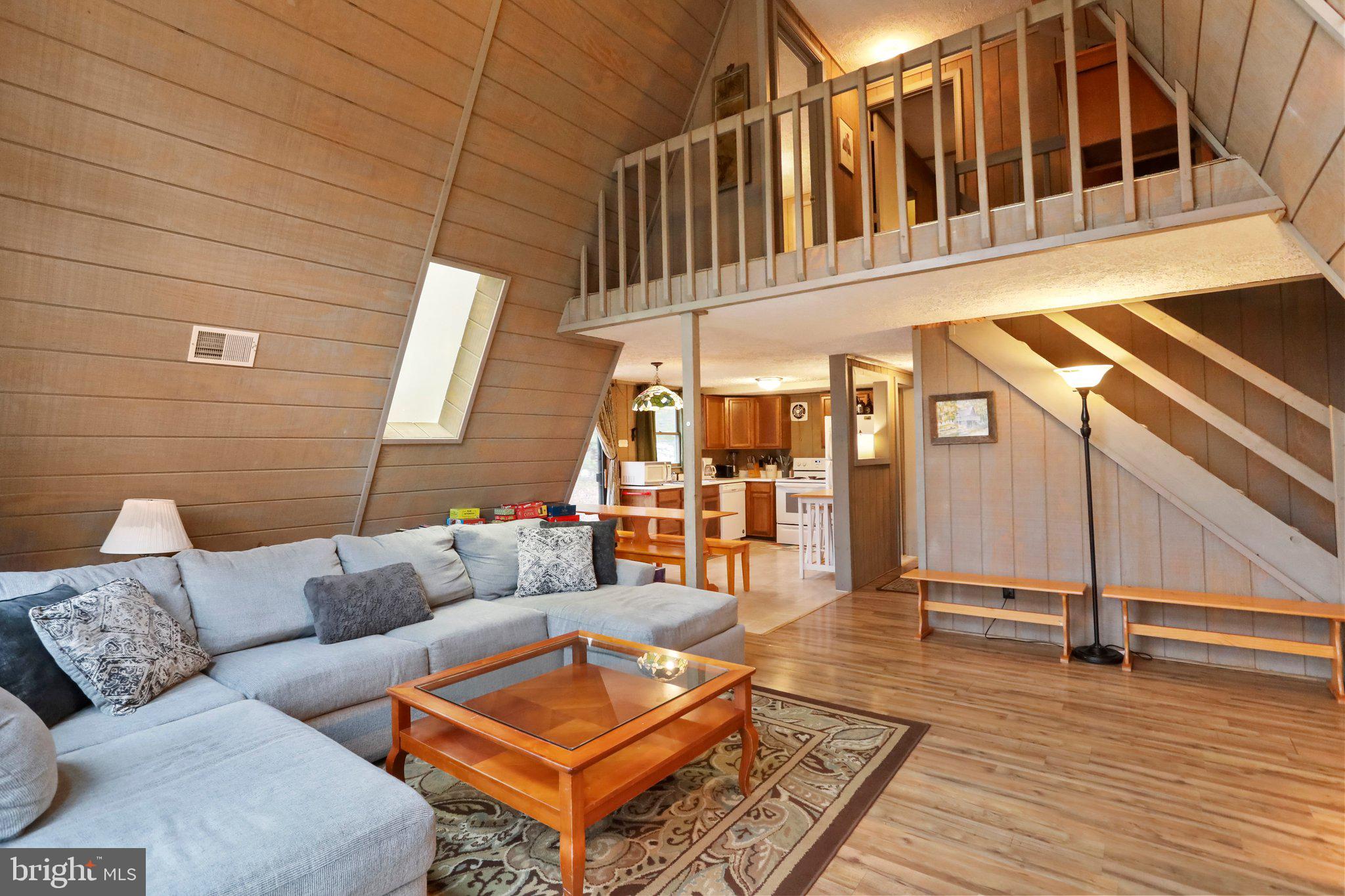 13 Mountainside Loop Berkeley Springs, WV 25411 - Photo 7 of 57 a outdoor living space with patio furniture