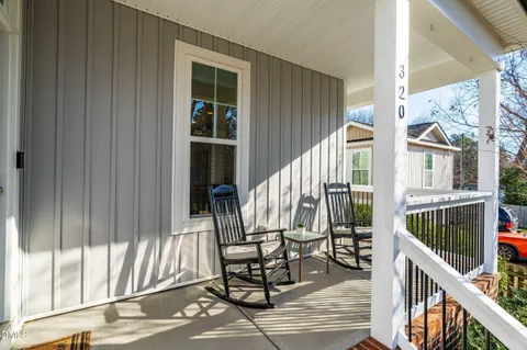a view of balcony with furniture