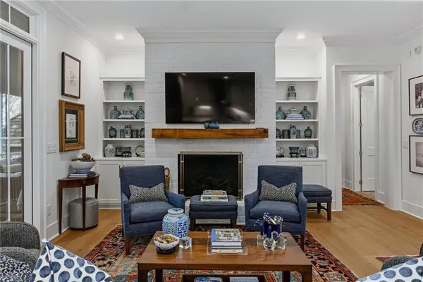 a bathroom with a toilet sink shower and mirror