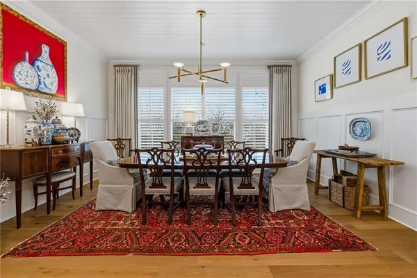 a bathroom with a toilet a sink and a window
