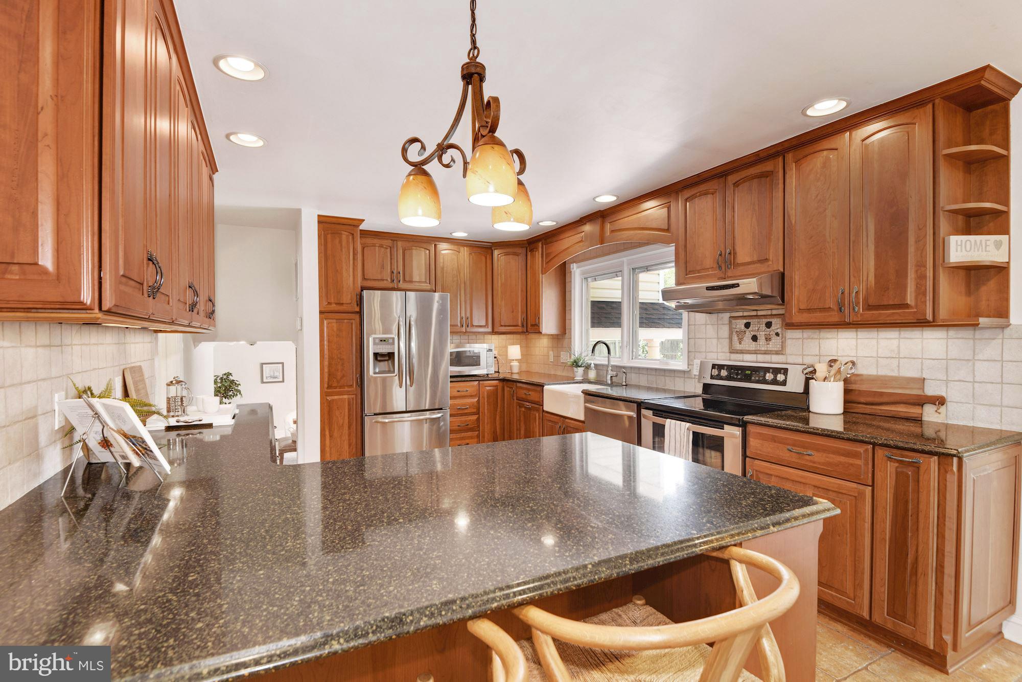 291 Halsey Road Annapolis, MD 21401 - Photo 14 of 42 Upgraded countertops with a breakfast bar!