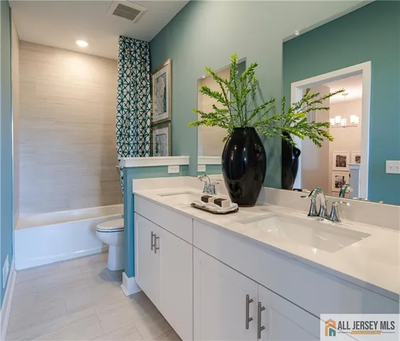 a bed room with a bed and a window