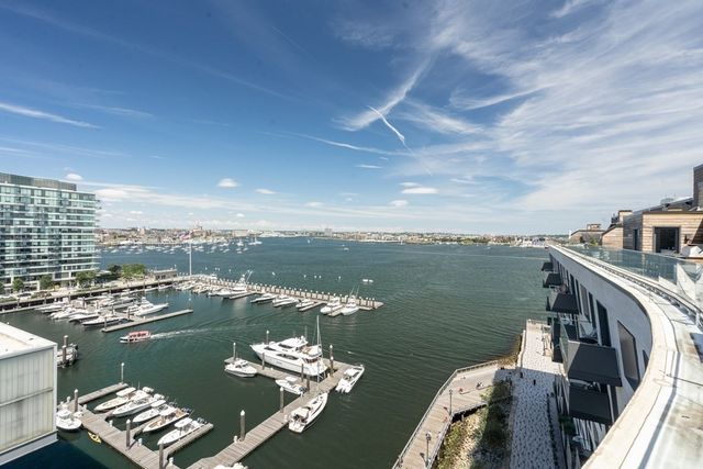 a view of a balcony with wooden floor
