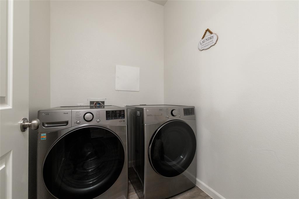 953 Ben Drive Springtown, TX 76082 - Photo 27 of 38 a utility room with dryer and washer