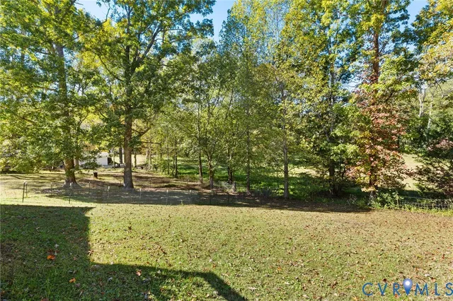 a view of a yard with an trees
