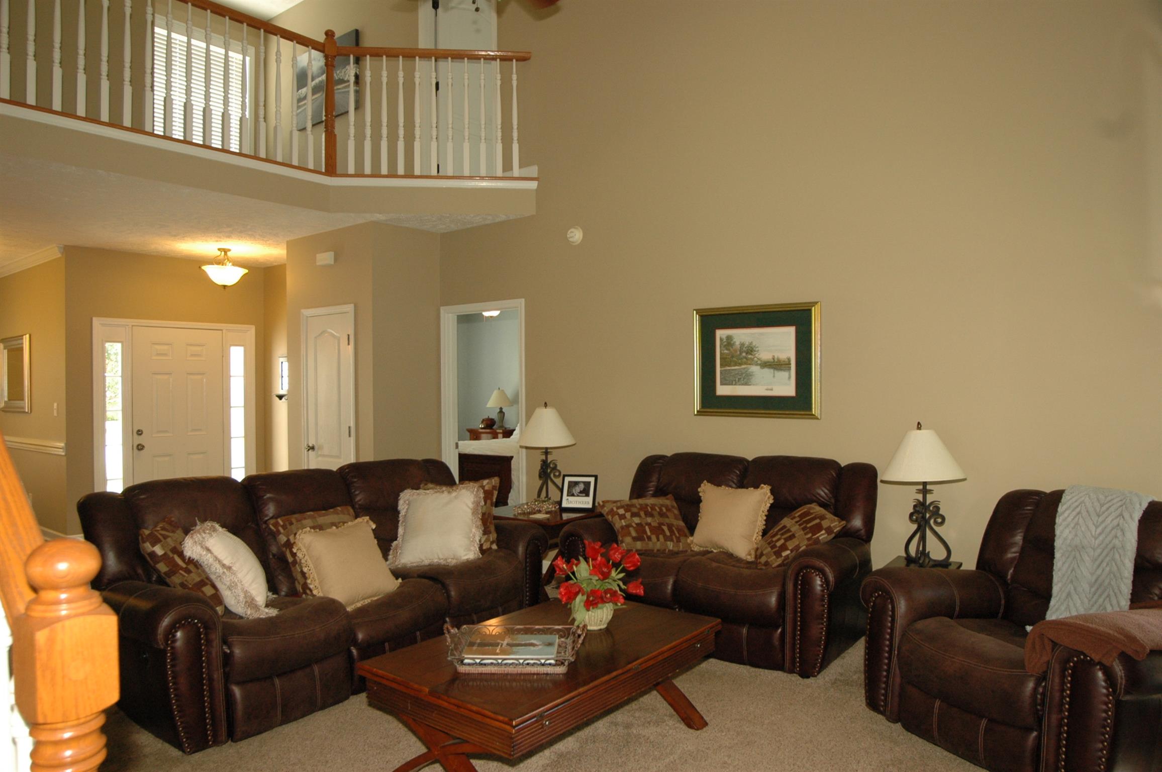 Living room with vaulted ceiling