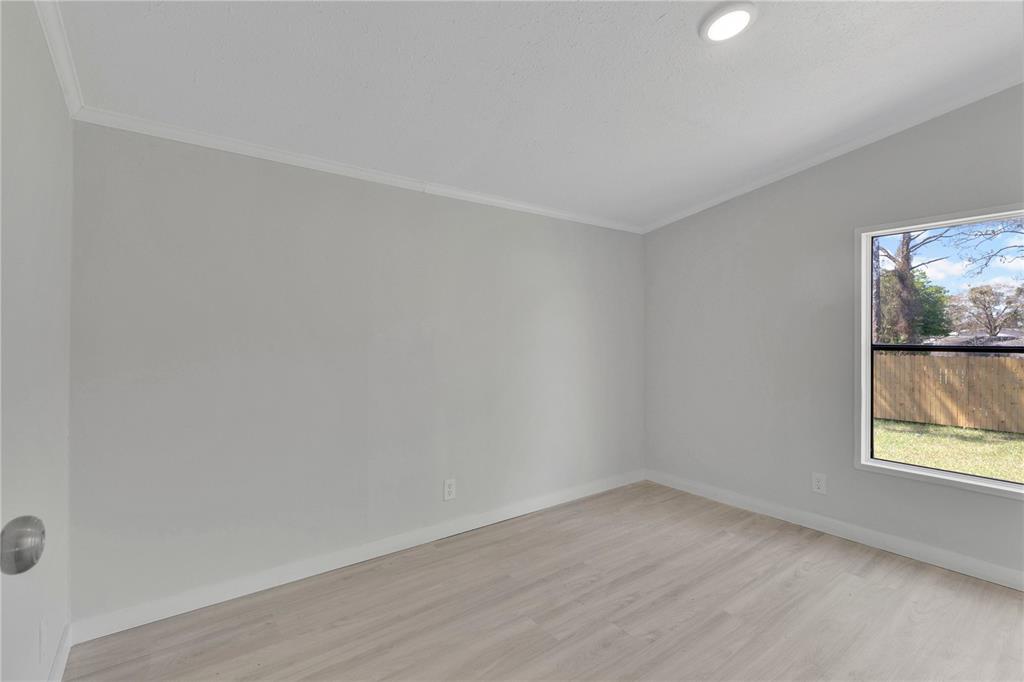 9180 Concord Road St. Cloud, FL 34773 - Photo 13 of 23 a view of an empty room and window