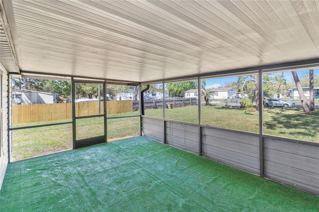 9180 Concord Road St. Cloud, FL 34773 - Photo 14 of 23 a view of an outdoor space and deck