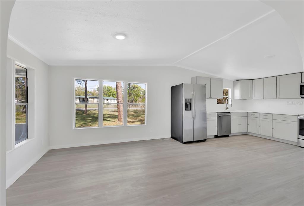 9180 Concord Road St. Cloud, FL 34773 - Photo 3 of 23 a view of an empty room with a window