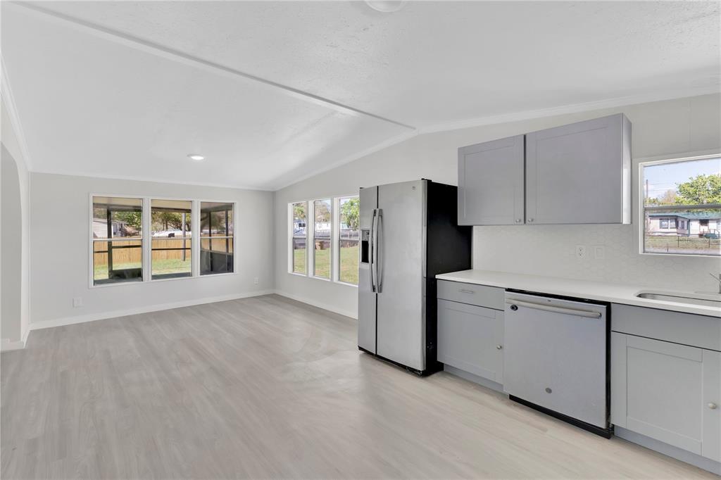 9180 Concord Road St. Cloud, FL 34773 - Photo 4 of 23 a view of a kitchen with refrigerator and window