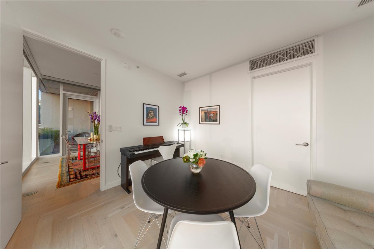 313 West 17th Street, Unit 1104 Austin, TX 78701 - Photo 21 of 40 Flexible second bedroom to accommodate a guest retreat, creative studio, or home office. Plus a walk-in closet that connects directly to the second full bath, ideal for guests or a private home office.