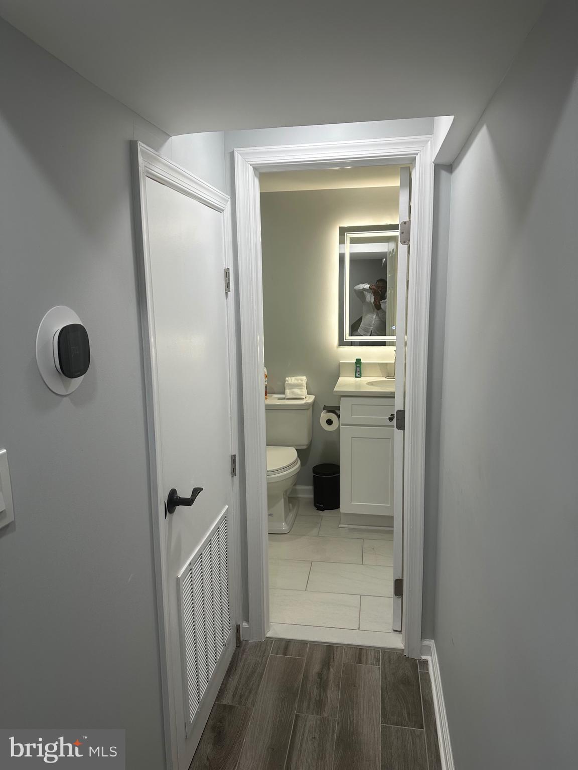 806 Sligo Avenue Silver Spring, MD 20910 - Photo 11 of 31 a bathroom with a sink a toilet and shower