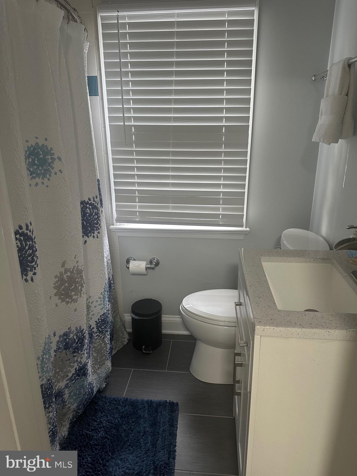 806 Sligo Avenue Silver Spring, MD 20910 - Photo 19 of 31 a bathroom with a toilet and a sink