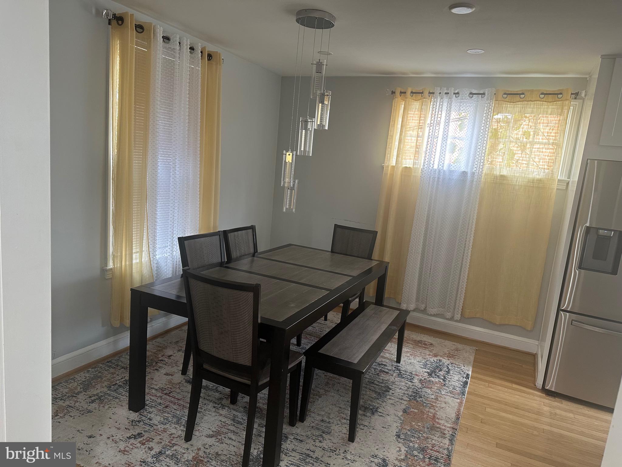 806 Sligo Avenue Silver Spring, MD 20910 - Photo 4 of 31 a dining room with furniture and window