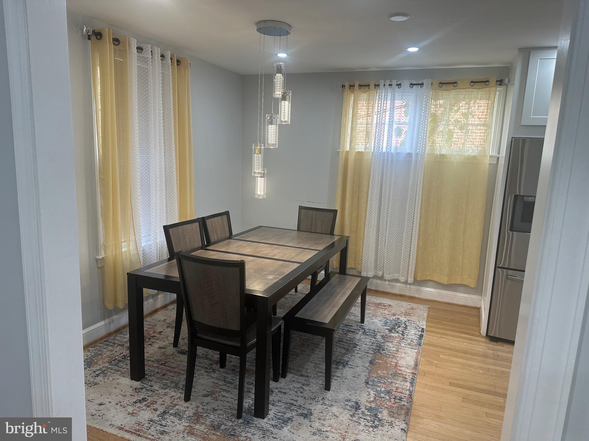 806 Sligo Avenue Silver Spring, MD 20910 - Photo 5 of 31 a dining room with furniture and window
