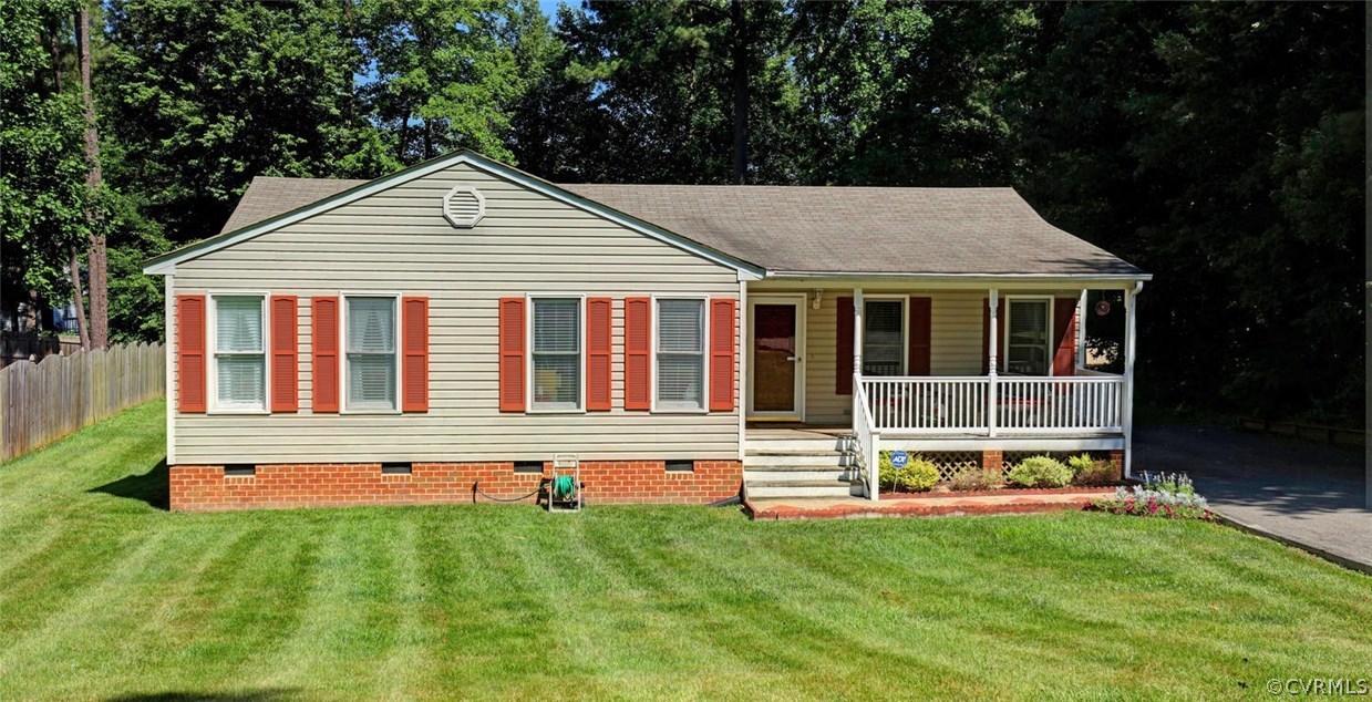 2606 Iverson Road Midlothian, VA 23112 - Photo 1 of 19 a front view of a house with a yard