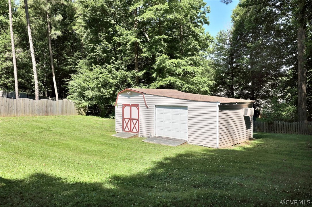 2606 Iverson Road Midlothian, VA 23112 - Photo 18 of 19 a front view of a house with a yard