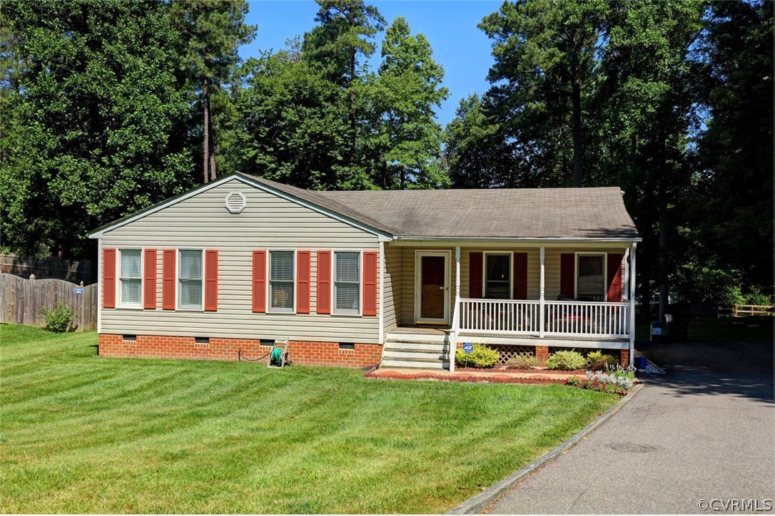 2606 Iverson Road Midlothian, VA 23112 - Photo 2 of 19 a front view of a house with a yard